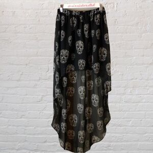 H&m black sugar skull hi low skirt. Elastic waist size four. NWOT.